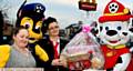 CHELSEA Johnson, Chase from Paw Patrol, manager Wendy Riella, Marshall from Paw Patrol, with the winning prize of name that bear
