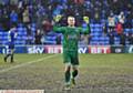 MUDDY MARVEL . . . spot-kick saviour Connor Ripley salutes the supporters at the final whistle
