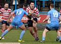 AWAITING INJURY NEWS . . . Roughyeds' Phil Joy (right)