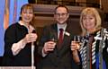 RAISING a glass . . . cinema manager Paul Dagg with sponsors Helan Graham and Stephanie Doherty