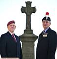 PROUD . . . Trevor Warren (left) and Alan Noble pictured at the war memorial at Oldham Parish Church