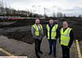 TAKING shape . . . Rob Fuller, centre, chairman of Avro FC checks on progress at the newly-named Vestacare Stadium with Norman Lowrey (left), Vestacare managing director, and Danny Hughes Vestacare director