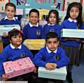 BOXING clever . . . Back, from left, Mohammed Ayaan, Isameel Khan, Zulayakha Tahir and Amelia Aziz. Front Inaya Chowdury and Ibraheen Ahmed 