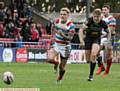 ON THE MARK . . . George Tyson (right) was one of five Oldham try-scorers against Dewsbury