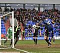 BACK-POST HEADER . . . beating his man to the jump, Athletic striker Aaron Amadi-Holloway goes close