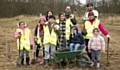 COMMUNITY members at Snipe Clough planting event in December