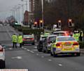 POLICE at the scene where a woman was knocked down by lorry on Manchester Road