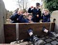 Pupils from Thorp Primary School visit the stocks outside St. Paul's Church, Royton, which have been restored by Royton Local History Society. Pic shows Oscar Bailey being bombarded by his classmates left to right, Roan Mallinson, Blake Beckman, Aimee Leigh.