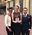 SO proud . . . Nicola with mum Gill, boyfriend Edward Harding and her MBE