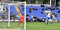 GET IN THERE . . . Lee Erwin scores for Latics in the early stages. 