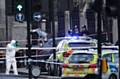 FORENSIC officers close to the Palace of Westminster