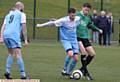 ON TARGET: Heyside's Daniel Dunn (centre)