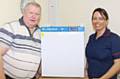 THAT'S cool . . . Vicki Elcock with John Bispham who donated £450 for a fridge to store antibiotics at Butler Green Enhanced Intermediate Care Centre