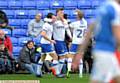 Lee Erwin celebrates his goal at Peterborough