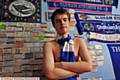 BY GEORGE . . . Parkin, who is known for taking his top off at matches, pictured in his bedroom with Latics memorabilia
