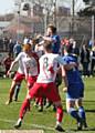 HIGH JUMP: Dylan King (left), of Athletic under-18s, climbs above the Stags defence