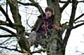 TREE top protest . . . John Jackson makes his feelings known