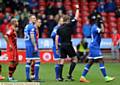 OFF . . . Lee Croft (partially hidden) receives his marching orders from referee John Brooks. 
