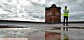 UP on the roof . . .  Craig Holden (group HR director) at Heron Mill which will be used as a distribution warehouse