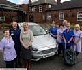 FUNDING delight . . . nurses and health care assistants, from left, Carole England, Adele Doherty (practice development), Joanne Sloan (director clinical services), Susan Mear, Assumpta Rabbitt, Brenda Harston, Linda Algar and Linda Waine