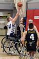 REACH UP. . . Martin Edwards (left), of Oldham Owls, and an Essex Outlaws rival at the tip off