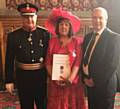 HONOUR . . . the Lord Lieutenant of Greater Manchester, Warren J Smith, with Liz and her husband Andrew