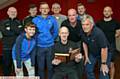 SET TO CLOSE AFTER 98 YEARS? . . . pictured are (back row, left to right): Kevin Moore, Jacob Graham, Anthony Lamb, Mike Carr and Ian Claridge. Front: Jack Carr, Paul Graham (secretary), Steven Race (president) holding the first minute book from 1919, Peter Maxson (chairman) and Steve Jones (treasurer).