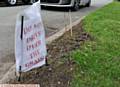 Drivers have mounted a grass verge on Middlegate, Garden Suburb. PIC shows sign on Rising Lane Close.