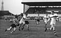 TOWERING PRESENCE . . . Blackpool's Alex Givvons (far right) tracks back to cover Oldham's Joe Collins in season 1964-65