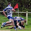 IN AT THE CORNER . . . Kieran McGinnity dives over for Oldham St Anne's. PICTURES by ANTHONY MILLER