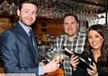 RAISING a glass at the new Gin and Juice bar opened  by MP Jim McMahon, left, pictured with owners, Carl and  Gill Taylor