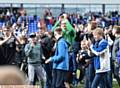 Oldham Athletic 1 Rochdale 1. Connor Ripley mobbed as the fans invade the pitch at full time