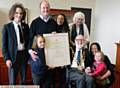 Bravery award from the Royal Humane Society presented to Graham Smith Scott by the Mayor Cllr. Derek Heffernan, for his actions helping out when a car crashed onto on a 100 foot cliff ledge in Whitby. Back left to right, Theo Smith Scott, Graham Smith Scott, Dominie Smith Scott (17), Pat Jones (mother-in-law). Front left to right, Lorca Smith Scott, Mayor Cllr. Derek Heffernan, Graham's wife Vicci Smith Scott, Halle Smith Scott.
