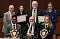 TOP marks 

. . . (back, from left) Ray Coverley (Community Service Chairman and organiser), Nadia Magro-Smart (16+ runner up/ Hulme GS), Neil Taylor (President) and Daisy Hilton (11-15 runner up/ Hulme GS). Front: Jahangir Alom (winner 16+/ Oldham Sixth Form College), Cllr Derek Heffernan (Mayor) and Katie Ball (winner 11-15/ Saddleworth School)