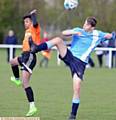 WATCH OUT: Year 11s Jamil Ahmad (Blue Coat, orange shirt) takes on Harrison Weiner, from North Chadderton