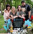 LEE Chatterley is having his beard shaved to raise funds for Sands. Pictured at Charlie's grave are, from left, grandmother, Diane Chatterley, grandmother, Nicky Rogers, mum, Hannah Chatterley, Poppy Chatterley, aged two and Lee