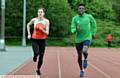 RIGHT ON TRACK . . . Sophie Hall and Reality Osouha, both 16, who struck gold for Oldham and Royton Harriers. PICTURE by ANTHONY MILLER