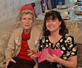 HAPPIER times . . . Elizabeth Crawford with grand-daughter Fiona at a Christmas party