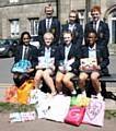 Blue Coat School pupils with some of the toiletries they collected for the victims of the Manchester attack from left) back Max Butterworth, Charlotte Blakeney, Jack Payton (front) Ridhiya Shaji, Jessica Kelly, Leah Williams, Kirsty Idoko