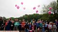 Children take part in a 2K run around Churchill Playing Fields. Before the race set off the runners let go of pink balloons in memory of the victims of the Manchester attack