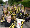 SWARMING around . . . Manchester Bees led by Anneli Ebden (front)