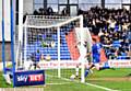 CAN'T MISS . . . Lee Erwin smashes home Athletic's winner against Bolton