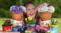 FLOWER power . . . Lilly Fitzpatrick (9) loves the flower stall at Dr Kershaw's Hospice summer fair