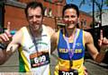 TOP runners . . . the first men and women over the finish line, Rob James and Sharon Johnston