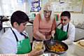 LENDING a hand . . .Sylvia Patterson with Wajhat Mahmood (left) and Rakeem Iqbal