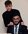 NEW mayor . . . Outgoing Youth Mayor T Jay Turner hands over the chain of office to new Mayor Marouf Ahmed