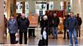 TRIBUTE . . . A minute's silence is observed in the Spindles Town Square Shopping Centre for London terror attack victims