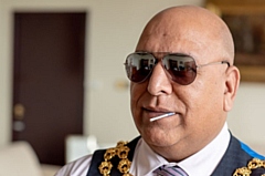 The Mayor of Oldham, Councillor Javid Iqbal, copies Kojak.

Pictures by Darren Robinson