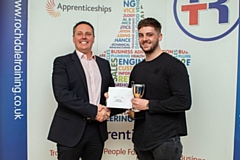 Oldham-based Brett Wardrope (right), of Hellermann Tyton, receives his Advanced Engineering Level 3 award  