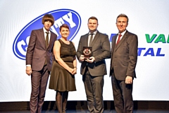 Pictured are Robert Hardman and Sara Orritt from County accepting the award from Tom Ward, presenter and comedian (far left) and Chris Milton, WhatVan event director (far right)